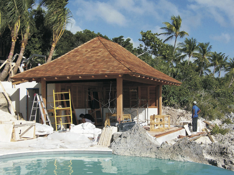 Mahogany pool cabana structure with motorized screen<br />panels, handmade operable louvers, bamboo ceiling panels,<br />prefabricated in Palm City - Naussau, Bahamas (Lyford Cay)