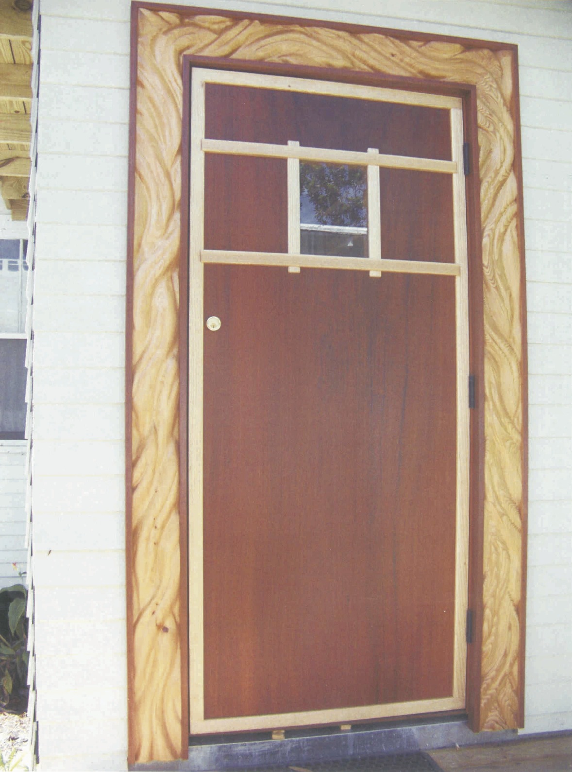 Mahogany door with carved cypress frame - Palm City