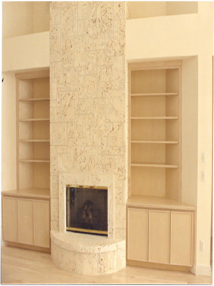 Stained ash/limestone fireplace assembly - Sailfish Point