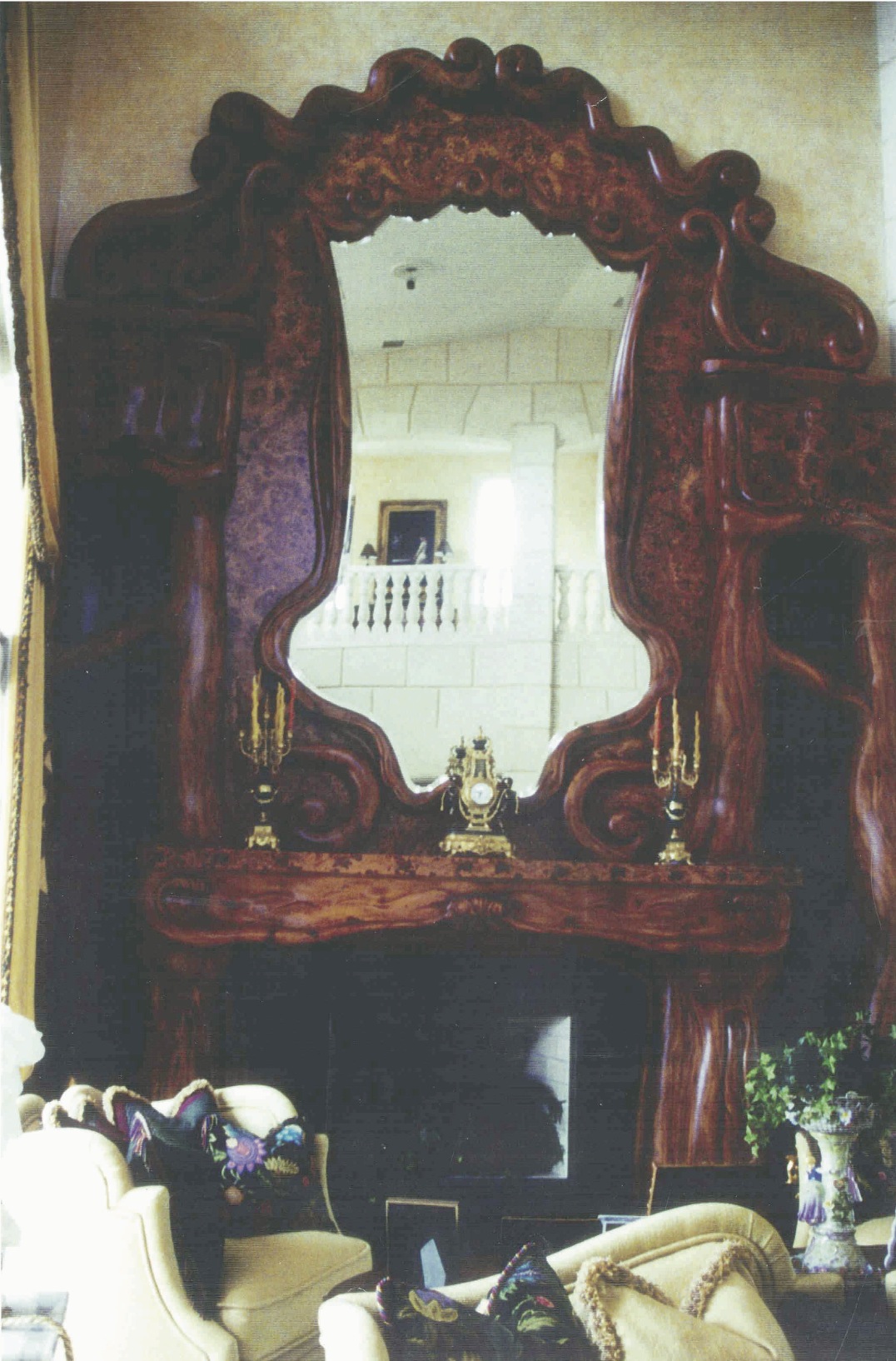 Carved mahogany/faux burl panels with half-round/radiused<br />niches with lighting, glass shelves, mantle section with<br />hand-carved sea turtles and marine life - Sailfish Point