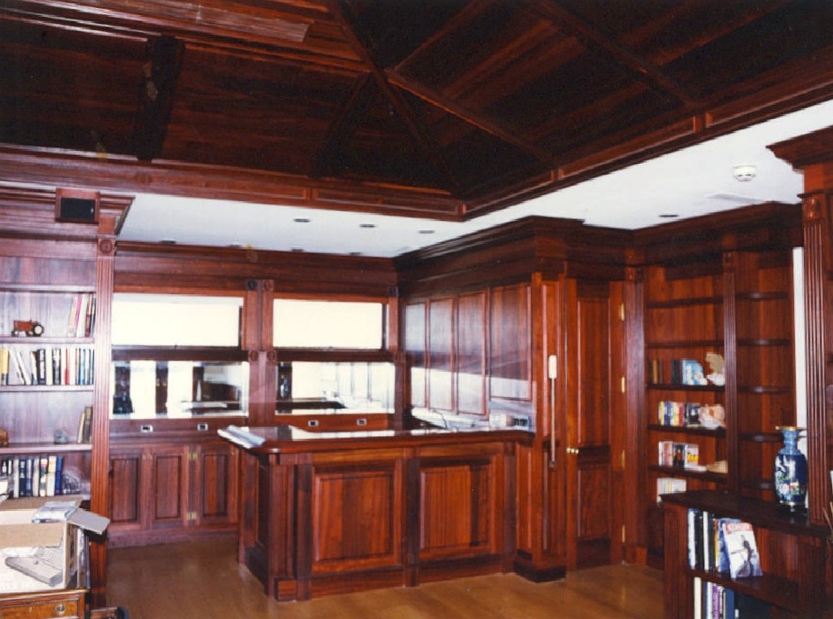 Solid padauk home theatre, bar, library with padauk<br />paneled ceiling - Sailfish Point