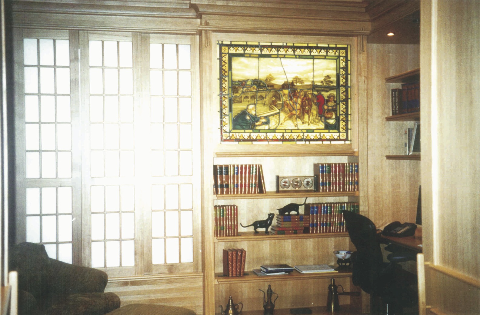 Oriental themed home office/library with shoji screen sliding<br />panels to conceal exterior windows - Sailfish Point