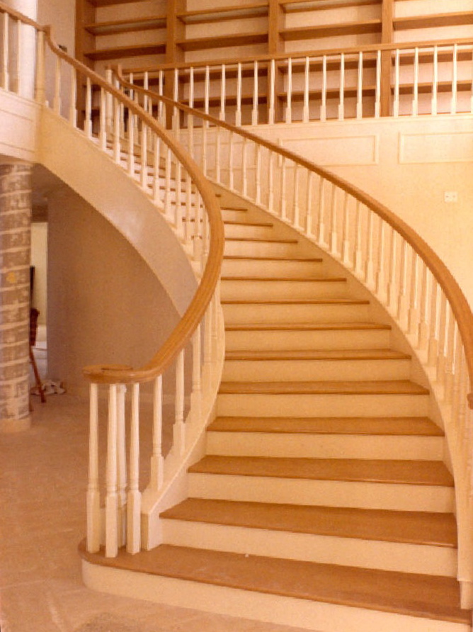 Floating circular staircase, upper rail system and ornamental<br />open shelving - Sailfish Point