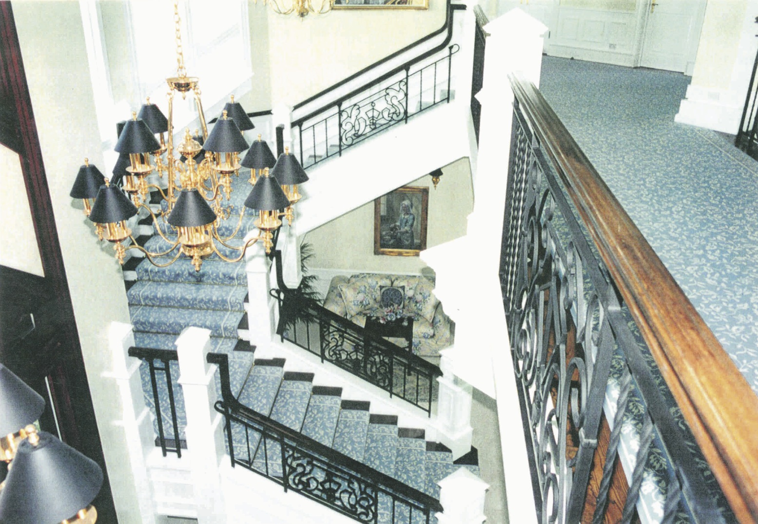 7' wide grand staircase using painted wood and iron with<br />monumental newels, three flights, two landings,  approx. 50'<br />horizontal railings/balustrade, view 2 - Sailfish Point
