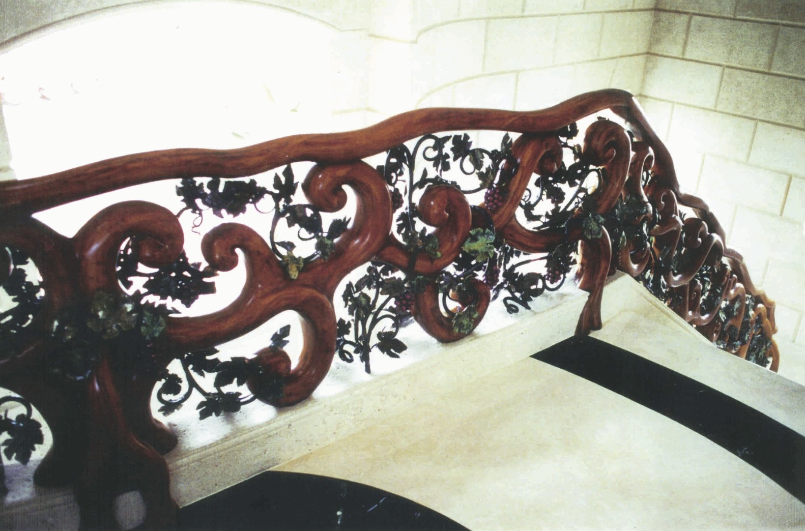 Carved mahogany with metal vines, leaves, flowers, all faux<br />finished, upper balustrade - Sailfish Point