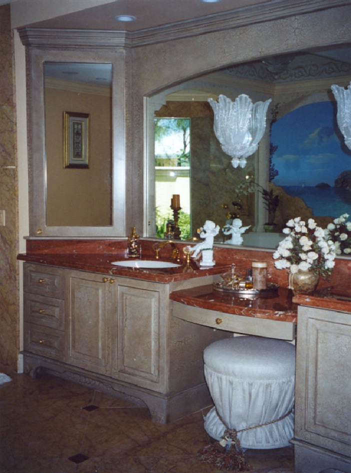 Her vanity with built-in manufactured cabinets, mirror<br />surround, faux finished - Sailfish Point