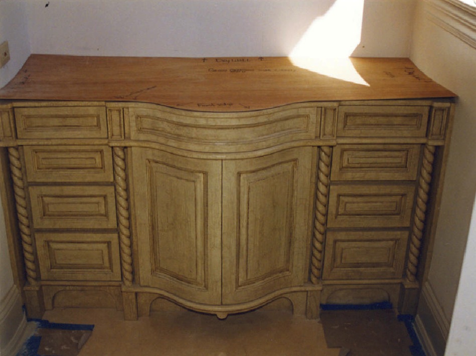 Bow front vanity, faux finished - Sailfish Point